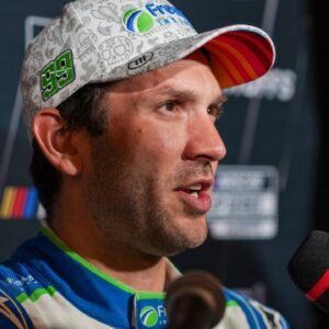 Daniel Suarez speaks to media members during the NASCAR Playoffs Media Day at the Charlotte Convention Center.