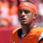 Denver Broncos cornerback Pat Surtain II (2) works out prior to the game against the Tampa Bay Buccaneers at Raymond James Stadium.