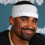 Philadelphia Eagles quarterback Jalen Hurts (1) reacts as he addresses media during training camp at NovaCare Complex.