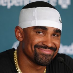 Philadelphia Eagles quarterback Jalen Hurts (1) reacts as he addresses media during training camp at NovaCare Complex.