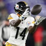Pittsburgh Steelers wide receiver George Pickens (14) makes a catch against the Baltimore Ravens in the third quarter in an AFC wild card game at M&T Bank Stadium.