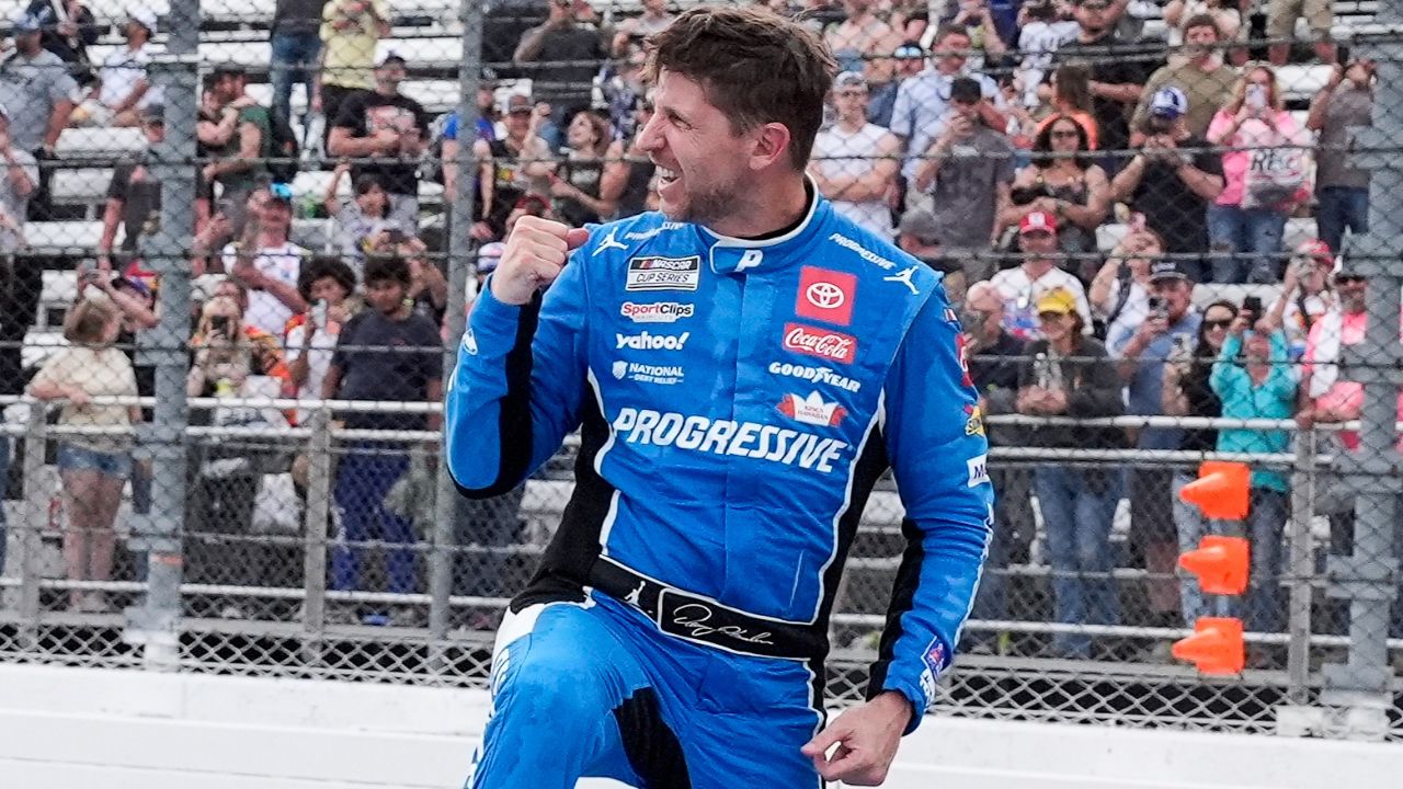 NASCAR Cup Series driver Denny Hamlin (11) celebrates his win during the Cook Out 400 at Martinsville Speedway.