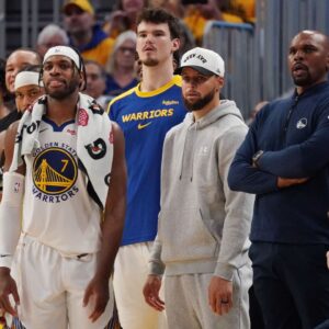 Golden State Warriors guard Stephen Curry (30) watches from the bench during game three against the Minnesota Timberwolves in the second round of the 2025 NBA Playoffs at Chase Center.