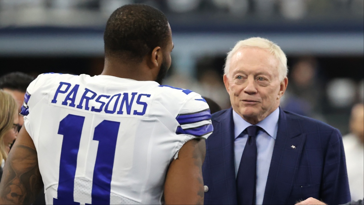 Dallas Cowboys outside linebacker Micah Parsons (11) meets with owner Jerry Jones (center) and NFL commissioner Roger Goodell (right) prior to the NFC Wild Card playoff football game against the San Francisco 49ers at AT&T Stadium.