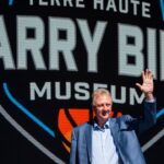 Larry Bird waves at the crowd gathered Thursday, May 30, 2024, for the grand opening ceremony of the Larry Bird Museum in Terre Haute, Indiana.