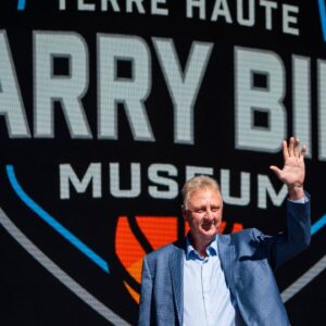 Larry Bird waves at the crowd gathered Thursday, May 30, 2024, for the grand opening ceremony of the Larry Bird Museum in Terre Haute, Indiana.