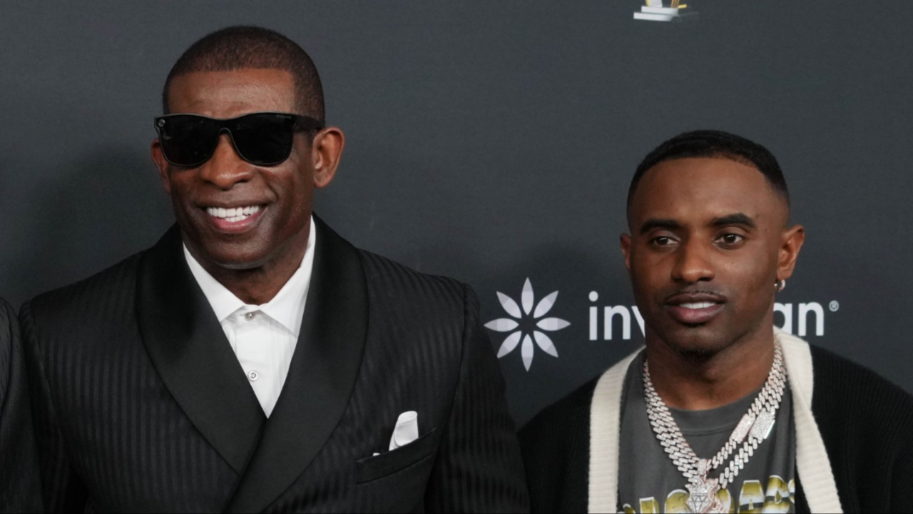 Deion Sanders with his sons Shedeur Sanders (left) and Deion Sanders Jr. (right) on the red carpet before Super Bowl LIX NFL Honors at Saenger Theatre.
