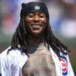 New Orleans Saints running back Alvin Kamara throws out a ceremonial first pitch prior to a game between the Chicago Cubs and the St. Louis Cardinals at Wrigley Field.
