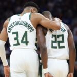 Milwaukee Bucks power forward Giannis Antetokounmpo (34) puts his arm around small forward Khris Middleton (22) during the third quarter against the Sacramento Kings at Golden 1 Center.