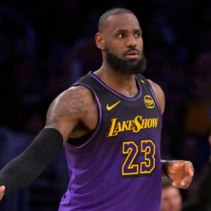 Nov 21, 2024; Los Angeles, California, USA; Los Angeles Lakers forward LeBron James (23) reacts after a 3-point basket in the second half against the Orlando Magic at Crypto.com Arena.