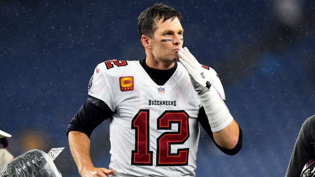 Tampa Bay Buccaneers quarterback Tom Brady (12) blows a kiss to fans after a game against the New England Patriots at Gillette Stadium.