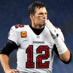 Tampa Bay Buccaneers quarterback Tom Brady (12) blows a kiss to fans after a game against the New England Patriots at Gillette Stadium.