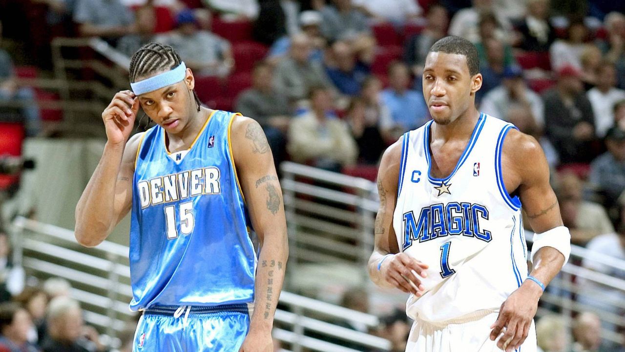 Tracy McGrady (Orlando Magic, re.) und Carmelo Anthony (Denver Nuggets) - (Icon7602908) Basketball Herren NBA 2003 2004, Orlando Magic