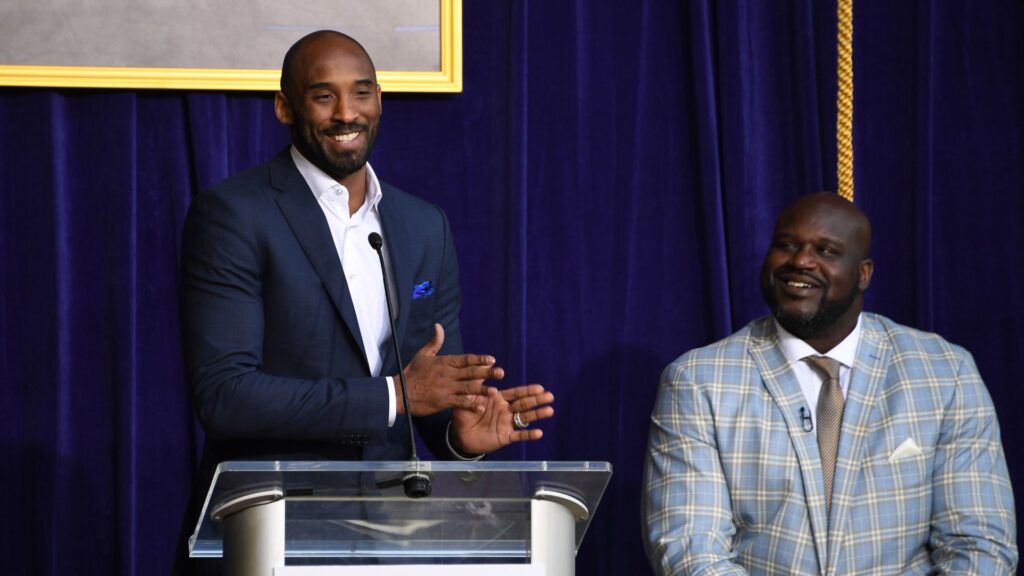 Mar 24, 2017; Los Angeles, CA, USA; Kobe Bryant (left) speaks during ceremony to unveil statue of Los Angeles Lakers former center Shaquille O'Neal at Staples Center.