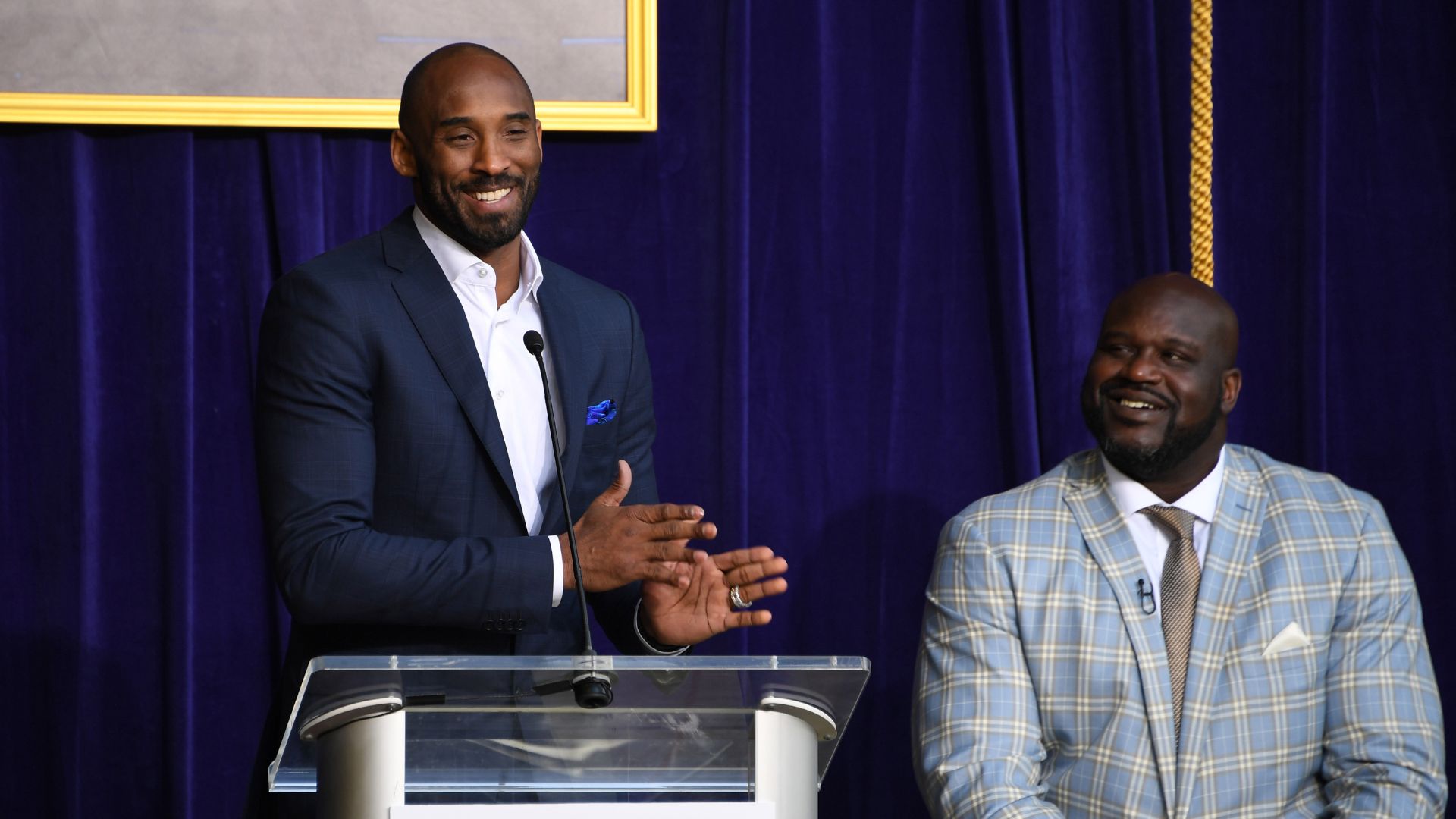 Mar 24, 2017; Los Angeles, CA, USA; Kobe Bryant (left) speaks during ceremony to unveil statue of Los Angeles Lakers former center Shaquille O'Neal at Staples Center.