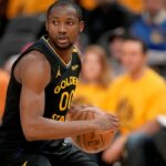 Golden State Warriors forward Jonathan Kuminga (00) holds onto the ball against the Minnesota Timberwolves in the fourth quarter during game four of the second round for the 2025 NBA Playoffs at Chase Center.