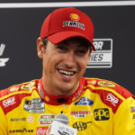 Aug 31, 2024; Darlington, South Carolina, USA; NASCAR Cup Series driver Joey Logano speaks with the media prior to practice for the Cook Out Southern 500 at Darlington Raceway. Mandatory Credit: Jasen Vinlove-Imagn Images