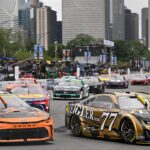 NASCAR Cup Series driver Tyler Reddick (45) and driver Carson Hocevar (77) drives during the Grant Park 165 at Chicago Street Race.