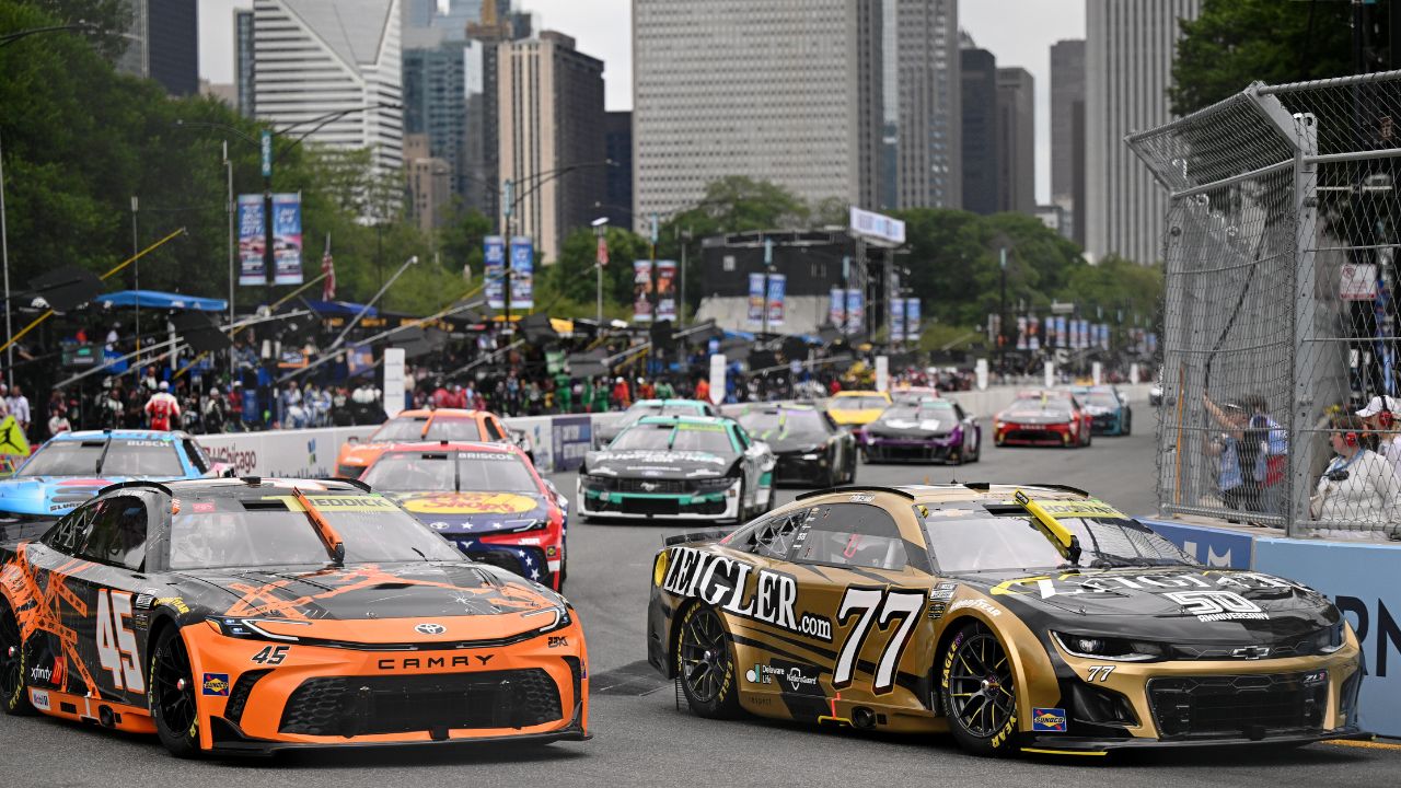 NASCAR Cup Series driver Tyler Reddick (45) and driver Carson Hocevar (77) drives during the Grant Park 165 at Chicago Street Race.