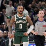 Milwaukee Bucks guard Damian Lillard (0) reacts after making a basket against the Indiana Pacers in the second half during game three of first round for the 2024 NBA Playoffs at Fiserv Forum.