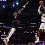 Los Angeles Lakers forward LeBron James (23) shoots against Portland Trail Blazers center Deandre Ayton (2) during the second half at Crypto.com Arena
