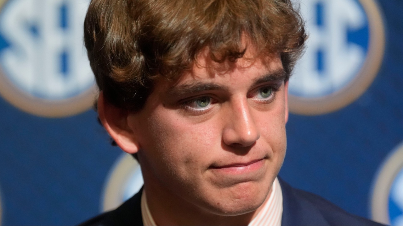 July 15, 2025; Atlanta, GA, USA; Texas quarterback Arch Manning listens to a question during SEC Media Days at the College Football Hall of Fame in Atlanta.