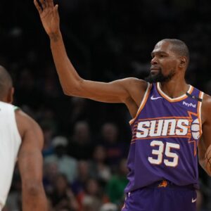 Phoenix Suns forward Kevin Durant (35) calls out a play against the Boston Celtics during the first half at Footprint Center.