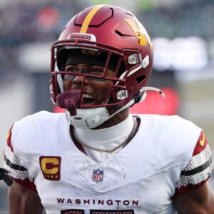 Washington Commanders wide receiver Terry McLaurin (17) reacts after a play with wide receiver Olamide Zaccheaus (14) against the Philadelphia Eagles during the first half in the NFC Championship game at Lincoln Financial Field.Commanders News: Insider Reflects on Terry McLaurin's Future in Washington Amid Trade Rumors