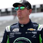 NASCAR Cup Series driver Kyle Busch looks on from pit road during practice and qualifying for The Great American Getaway 400 at Pocono Raceway.