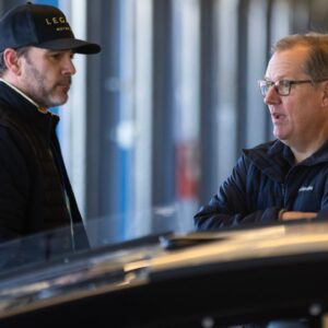 NASCAR Cup Series driver Jimmie Johnson (left) talks with crew chief Todd Gordon in the garage during testing at Phoenix Raceway.