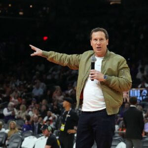 Phoenix Suns owner Matt Ishbia greets fans during a Ring of Honor half time ceremony of the game against the Utah Jazz at Footprint Center.