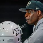 Colorado head coach Deion Sanders speaks with the media during 2025 Big 12 Football Media Days at The Star.