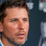 Denny Hamlin answers questions from the media during NASCAR Cup Series Playoff Media Day at Charlotte Convention Center.