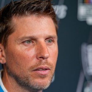 Denny Hamlin answers questions from the media during NASCAR Cup Series Playoff Media Day at Charlotte Convention Center.