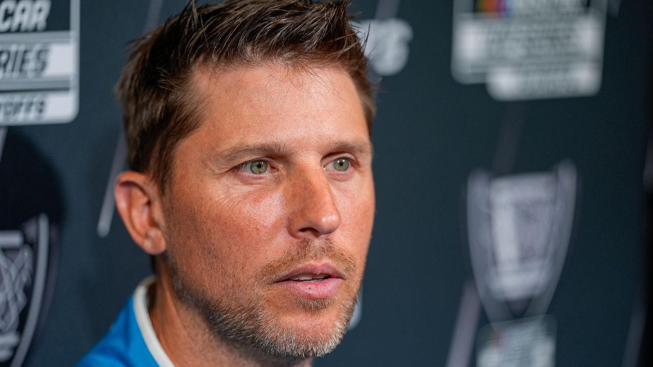 Denny Hamlin answers questions from the media during NASCAR Cup Series Playoff Media Day at Charlotte Convention Center.
