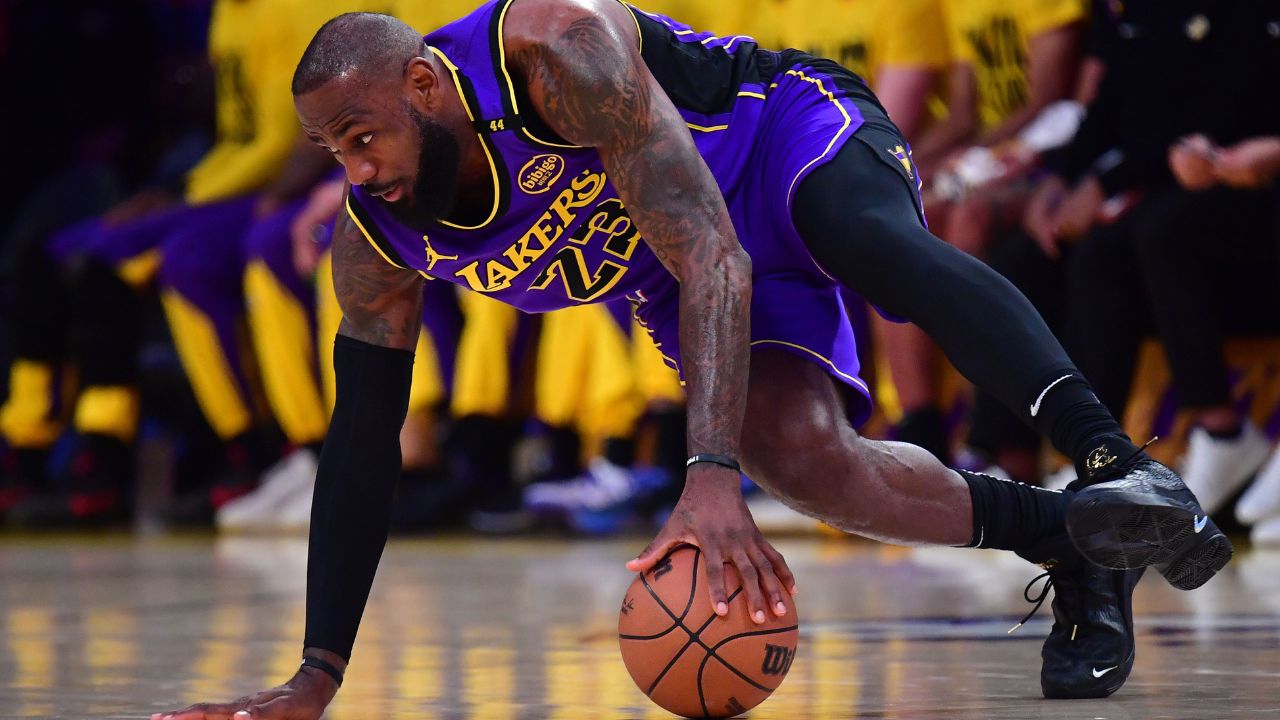 Los Angeles Lakers forward LeBron James (23) dribbles the ball against the Dallas Mavericks during the first quarter at Crypto.com Arena