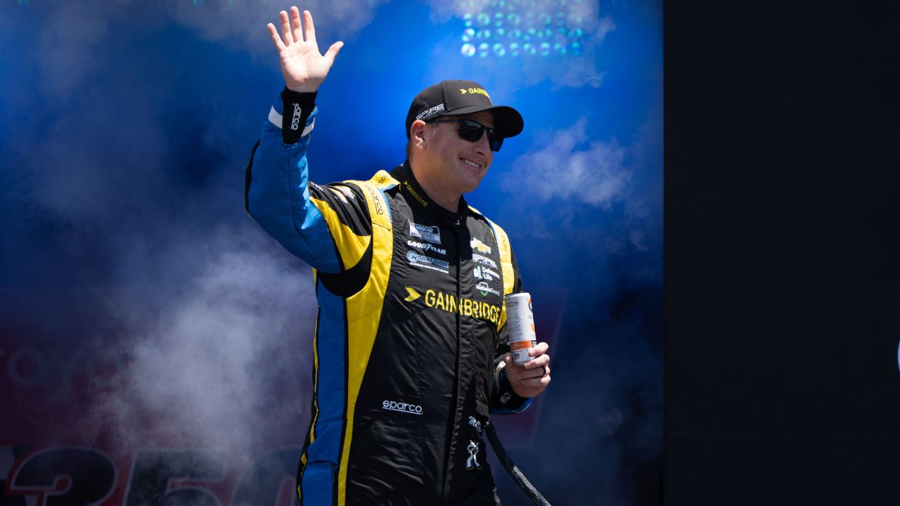 NASCAR Cup Series driver Michael McDowell (71) waves after being introduced to fans before the start of the NASCAR Toyota / Save Mart 360 at Sonoma Raceway.