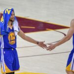 June 7, 2017; Cleveland, OH, USA; Golden State Warriors guard Stephen Curry (30) high-fives guard Klay Thompson (11) during the fourth quarter in game three of the 2017 NBA Finals against the Cleveland Cavaliers at Quicken Loans Arena