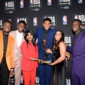 June 24, 2019; Los Angeles, CA, USA; Milwaukee Bucks forward Giannis Antetokounmpo poses with his family following his award of the NBA most valuable player at the 2019 NBA Awards show at Barker Hanger. Mandatory Credit: Gary A. Vasquez-Imagn Images