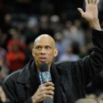 Milwaukee, WI, USA; Kareem Abdul-Jabbar, the leading scorer in Milwaukee Bucks and NBA history, waves to fans during game against the Utah Jazz at BMO Harris Bradley Center.