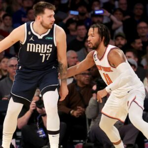 Dallas Mavericks guard Luka Doncic (77) controls the ball against New York Knicks guard Jalen Brunson (11) during the third quarter at Madison Square Garden.