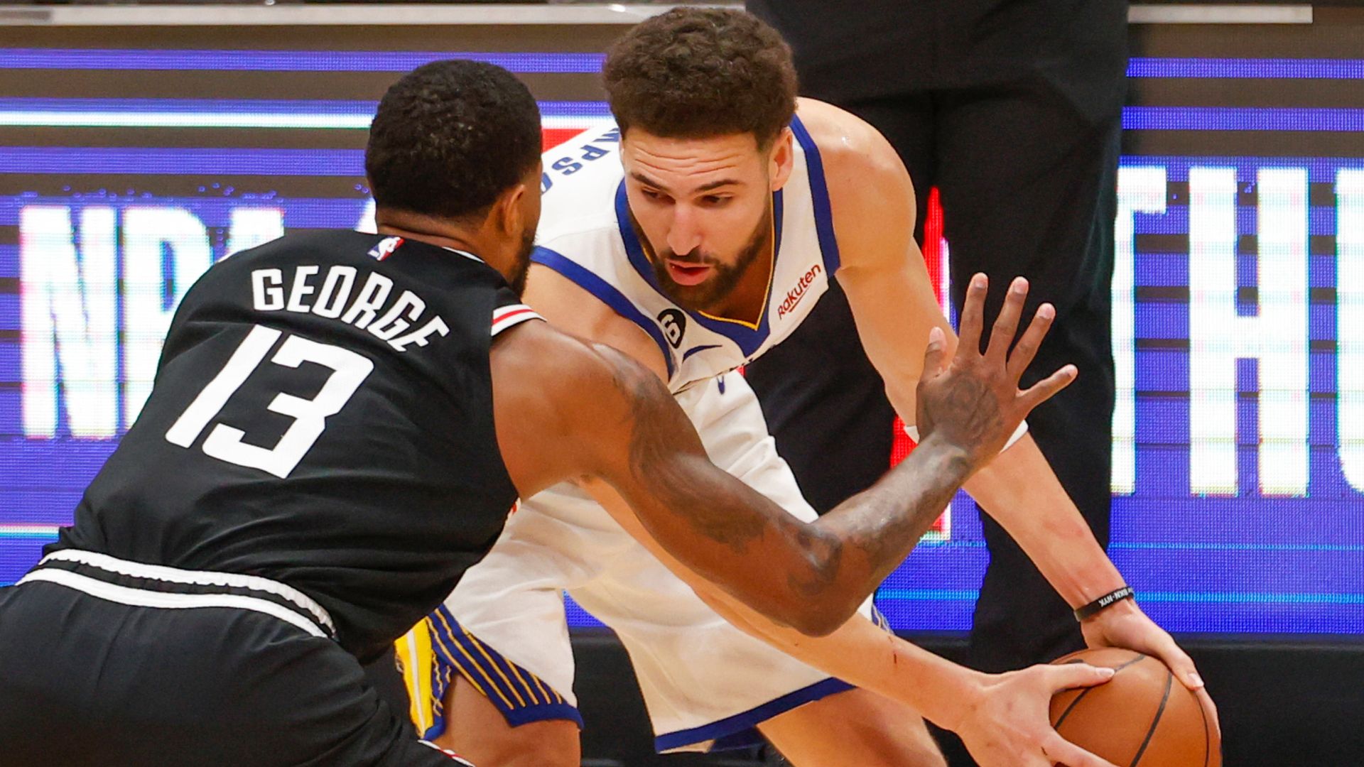 February 14, 2023, Los Angeles, California, USA: Golden State Warriors guard Klay Thompson (11) is defended by Los Angeles Clippers forward Paul George (13)
