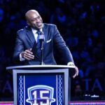 Former NBA star Vince Carter speaks during his jersey retirement ceremony at halftime of a game between the Brooklyn Nets and the Miami Heat at Barclays Center.