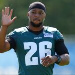Philadelphia Eagles running back Saquon Barkley (26) waves during training camp at NovaCare Complex.