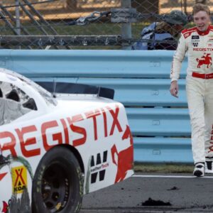 NASCAR Xfinity Series driver Connor Zilisch walks back to his car after winning the Mission 200 at The Glen at Watkins Glen International.