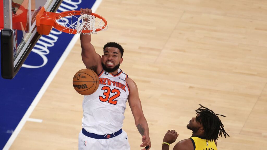 New York Knicks center Karl-Anthony Towns (32) dunks against Indiana Pacers forward Jarace Walker (5) in the fourth quarter during game five of the eastern conference finals for the 2025 NBA Playoffs at Madison Square Garden.