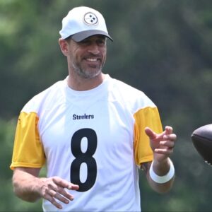 Pittsburgh Steelers quarterback Aaron Rodgers (8) gets the ball during minicamp at their South Side facility.