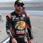 NASCAR Cup Series driver Chase Briscoe (19) walks to his car before the Iowa Corn 350 at the Iowa Speedway.