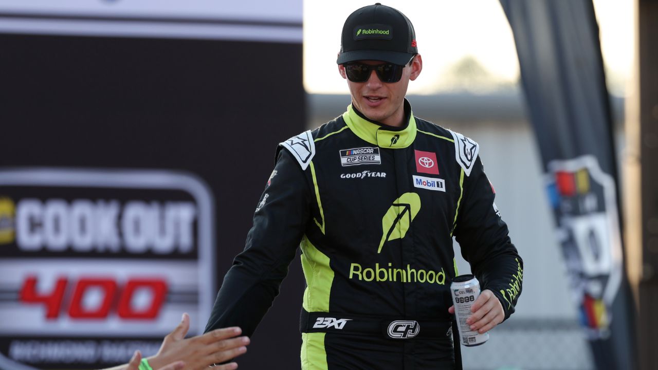 NASCAR Cup Series driver Corey Heim (67) shakes hands with fans during driver introductions prior to the NASCAR Cup Series Cook Out 400 at Richmond Raceway.