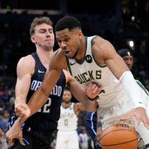 ; Milwaukee Bucks forward Giannis Antetokounmpo (34) drives against Orlando Magic forward Franz Wagner (22) in the first half at Fiserv Forum